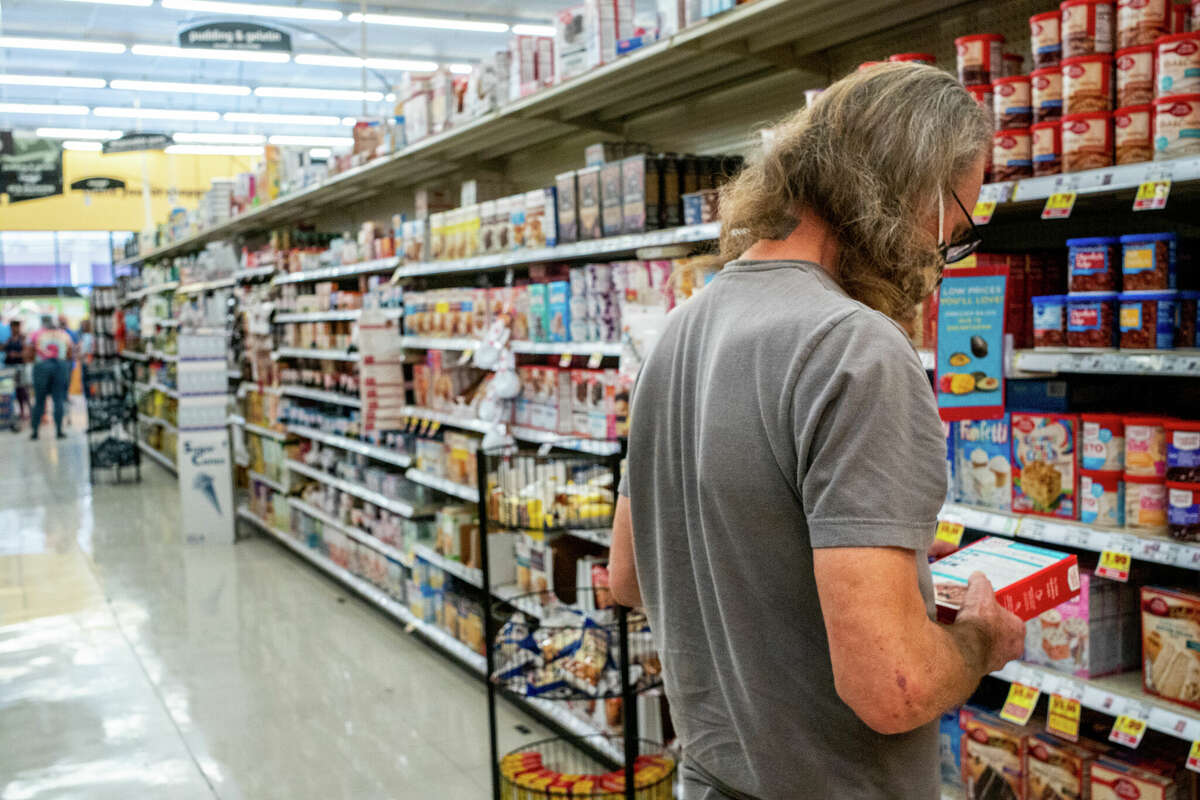 A customer shops in a Kroger grocery store on July 15, 2022 in Houston, Texas.