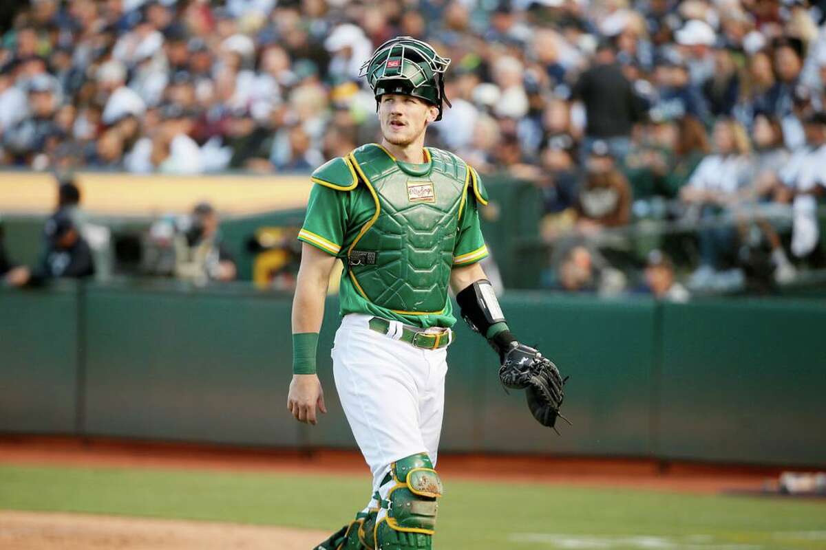 A's send Sean Murphy to Braves in three-team deal, net five-player