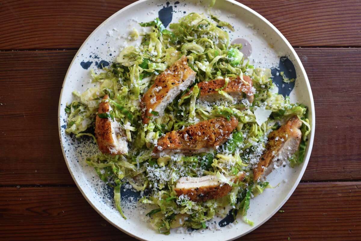 A riff on the basic Caesar salad adds Brussels sprouts and crispy