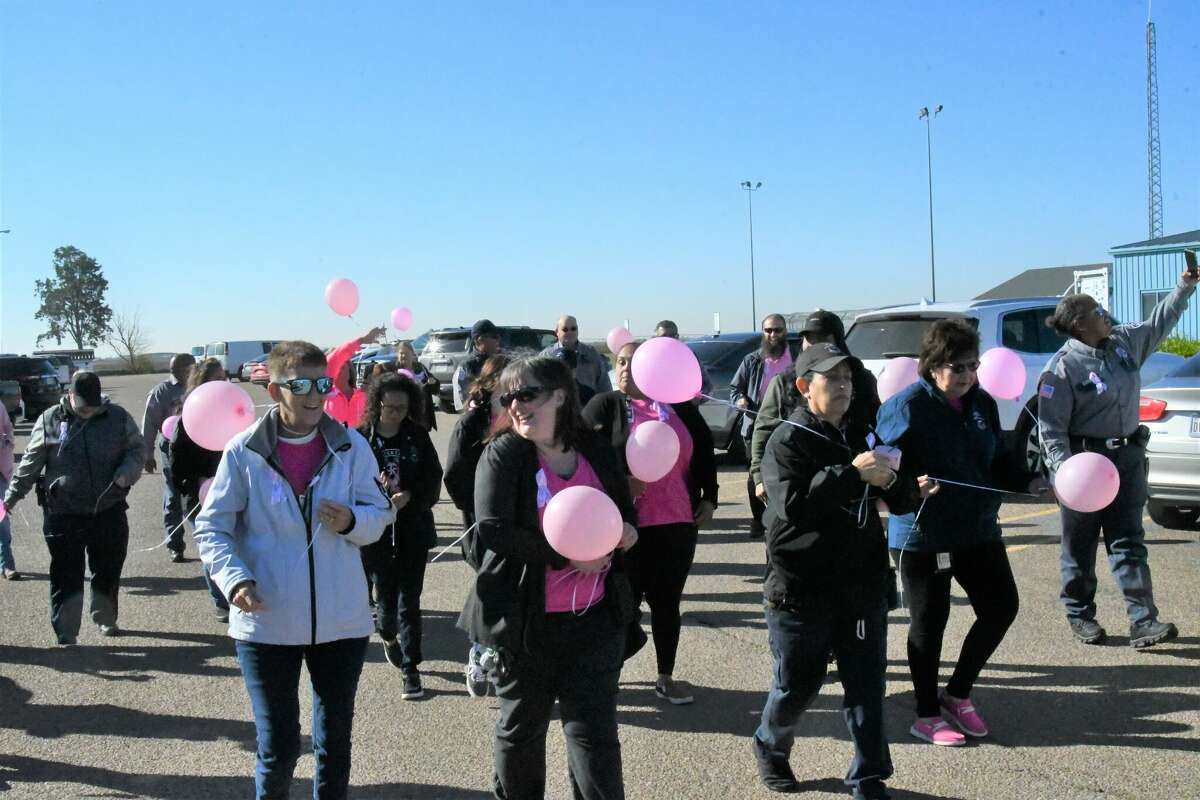 Formby Unit honors breast cancer fighters with walk and balloon release