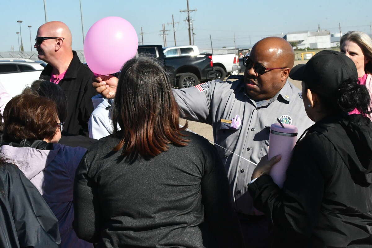 Formby Unit honors breast cancer fighters with walk and balloon release