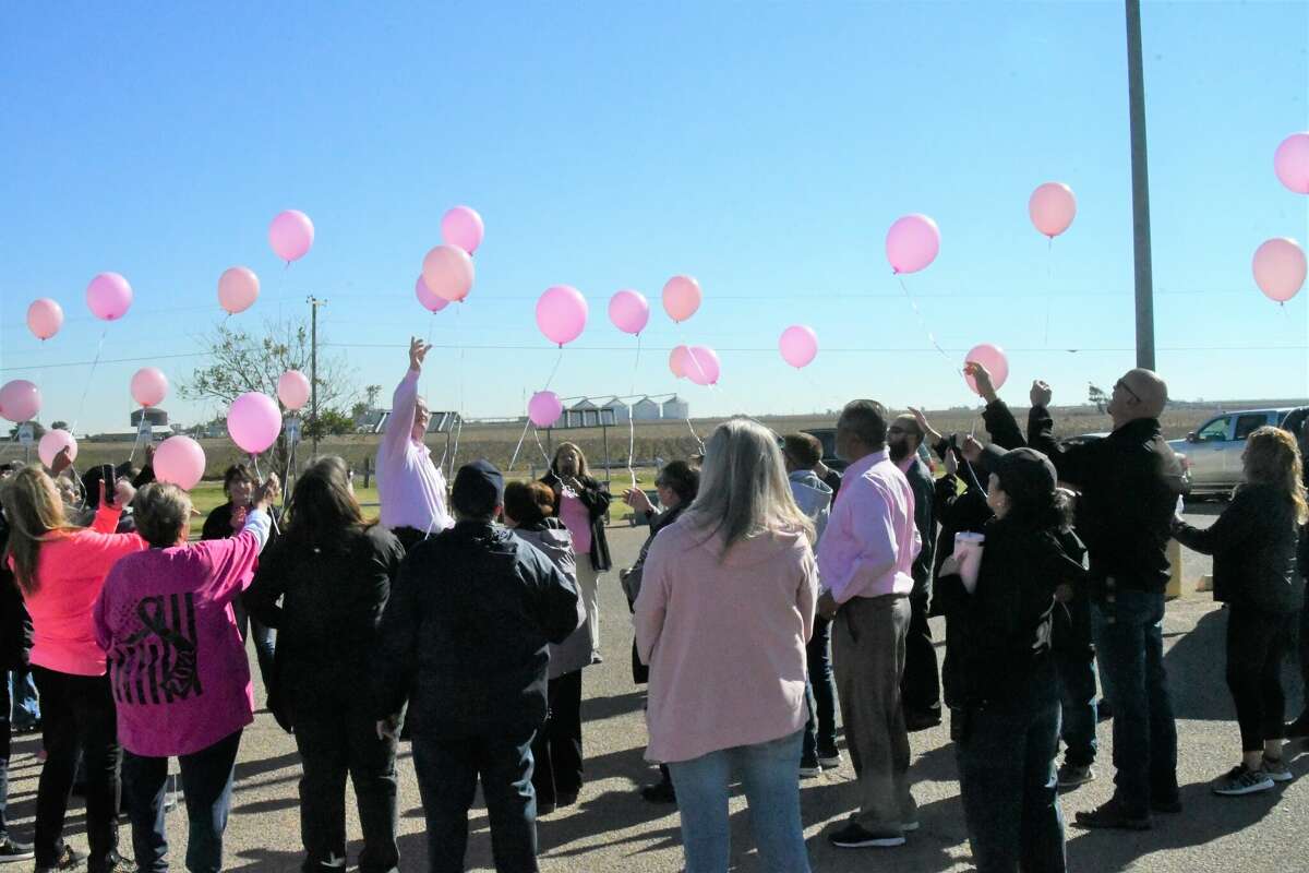 Formby Unit honors breast cancer fighters with walk and balloon release