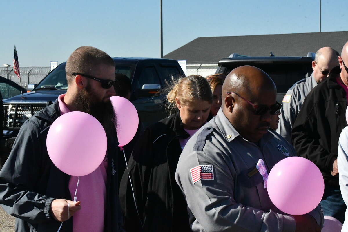 Formby Unit honors breast cancer fighters with walk and balloon release