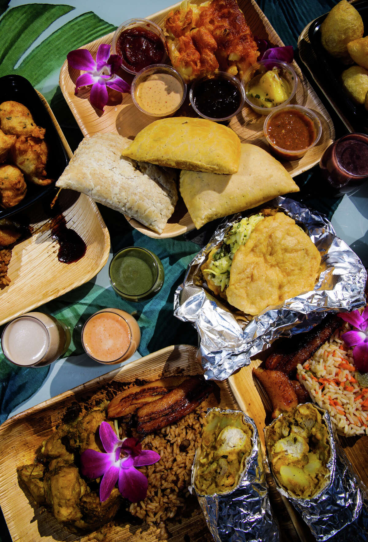 An array of dishes at Cocobreeze, a small Caribbean restaurant in Oakland that offers many Trinidad and Tobago favorites.
