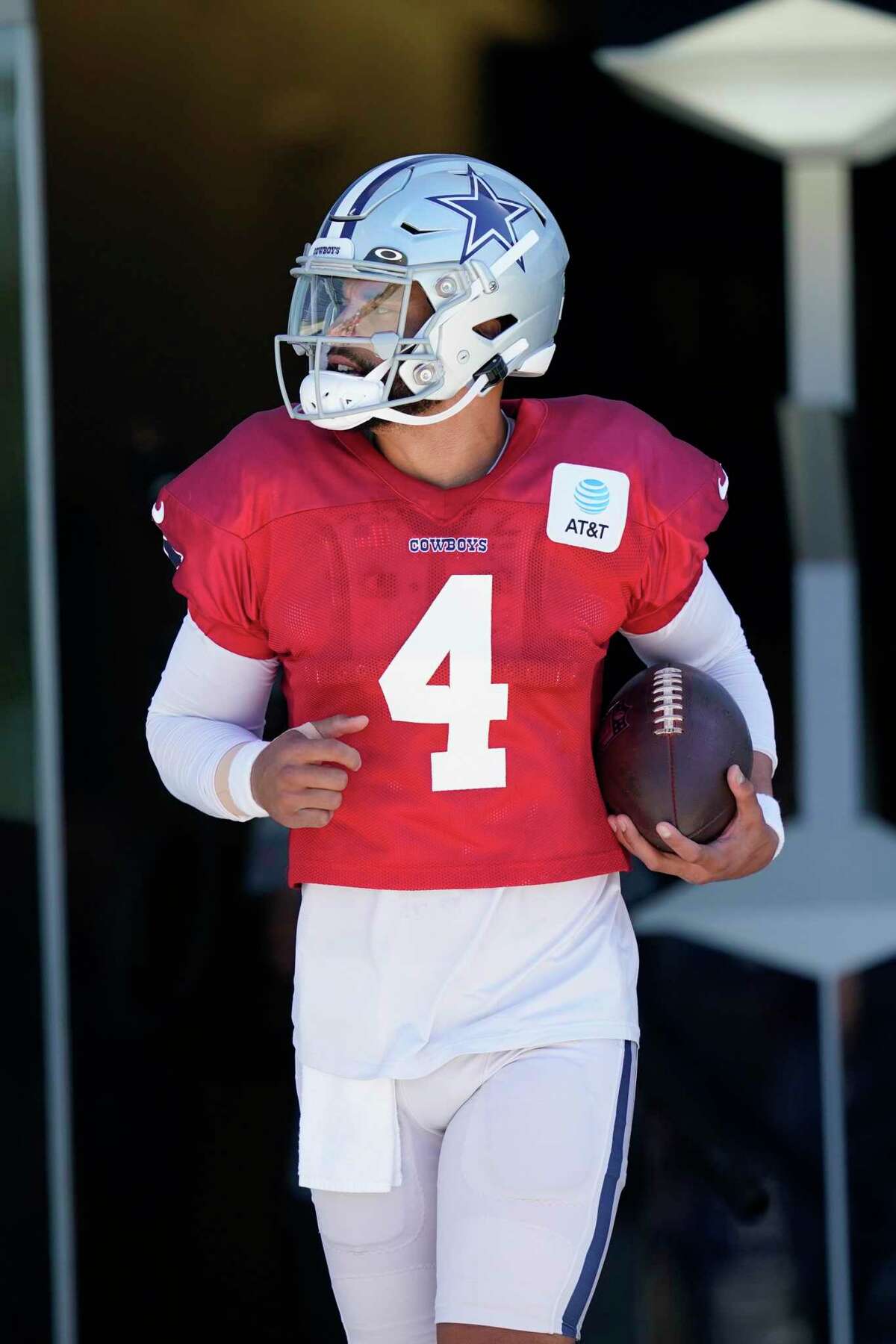 Dallas Cowboys quarterback Dak Prescott (4) hands off to running