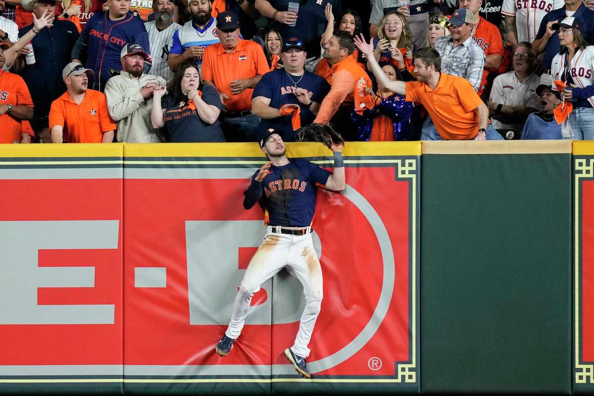 Houston Astros right fielder Kyle Tucker (30) makes a leaping catch on New York Yankees Aaron Judge’s fly ball in the eighth inning during Game 2 of the American League Championship Series at Minute Maid Park on Thursday, Oct. 20, 2022, in Houston.