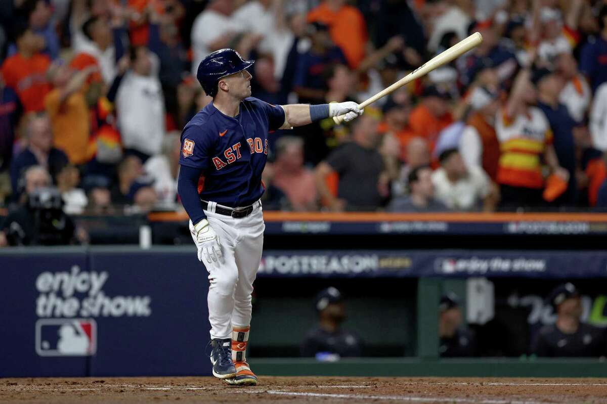 Alex Bregman admires his three-run homer that was the difference in Houston’s 3-2 win over New York in Game 2 of the ALCS.