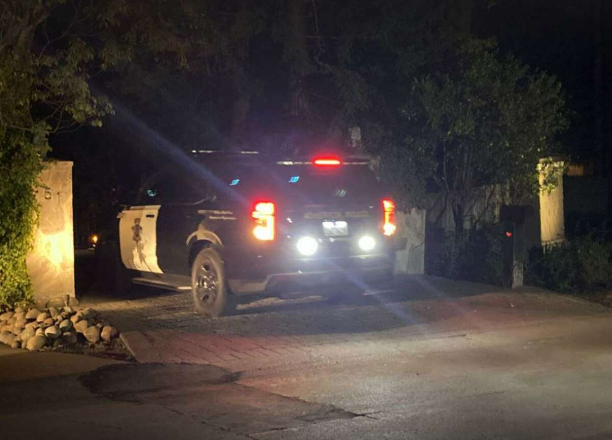 Atherton police vehicle drives into the property where landscapers made a bizarre discovey: a vehicle buried in the ground.