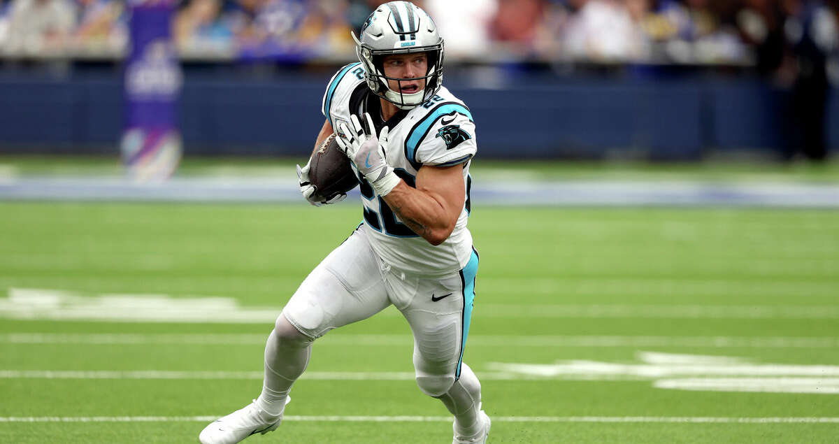 Christian McCaffrey #22 of the Carolina Panthers runs the ball in the first quarter during a game against the Los Angeles Rams at SoFi Stadium on October 16, 2022 in Inglewood, California. (Photo by Harry How/Getty Images)