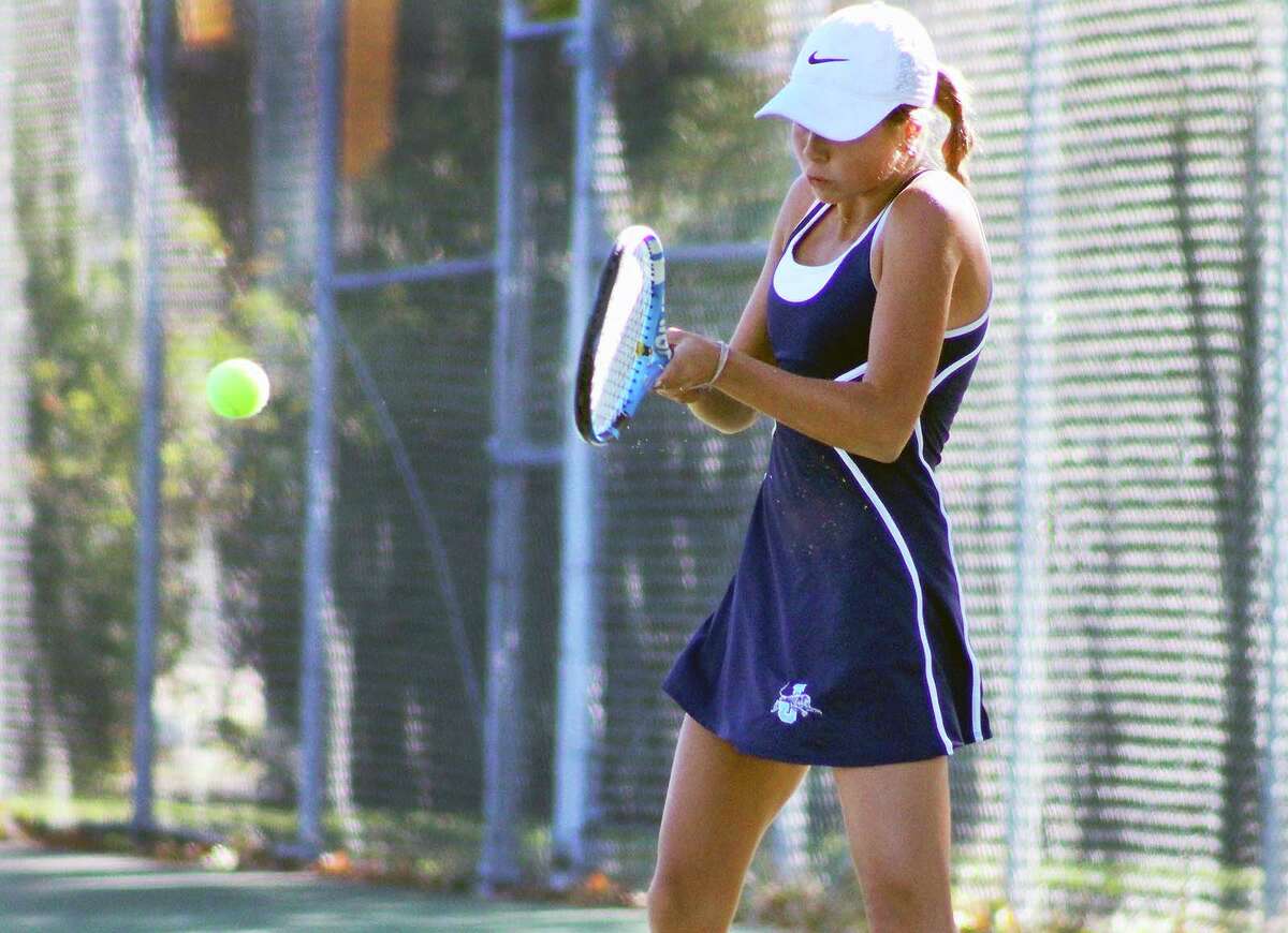 Jersey's Libby McCormick fell to No. 1-seeded  Lily Brecknock of Oak Park Fenwick in the first round of the IHSA Class 1A State tennis tournament Thursday in Elk Grove, then lost her back draw match, ending her season. She is shown in action in the Quincy Notre Dame Sectional last week.