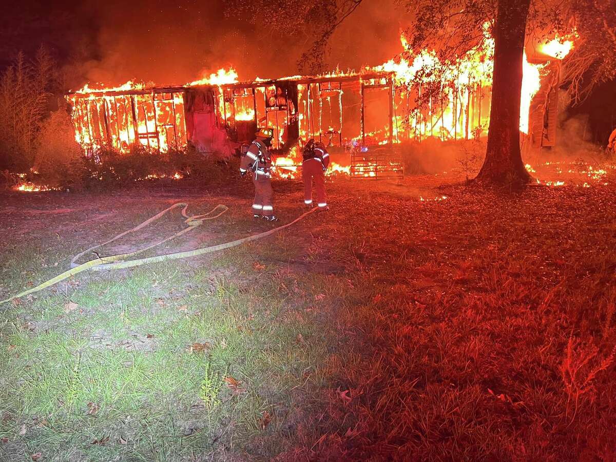 Several fire stations reported to a fire at a mobile home Friday morning, just southeast of Conroe.