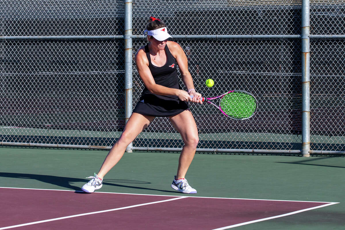 Story photo for The Memorial tennis team is headed to state for the 14th straight season.
