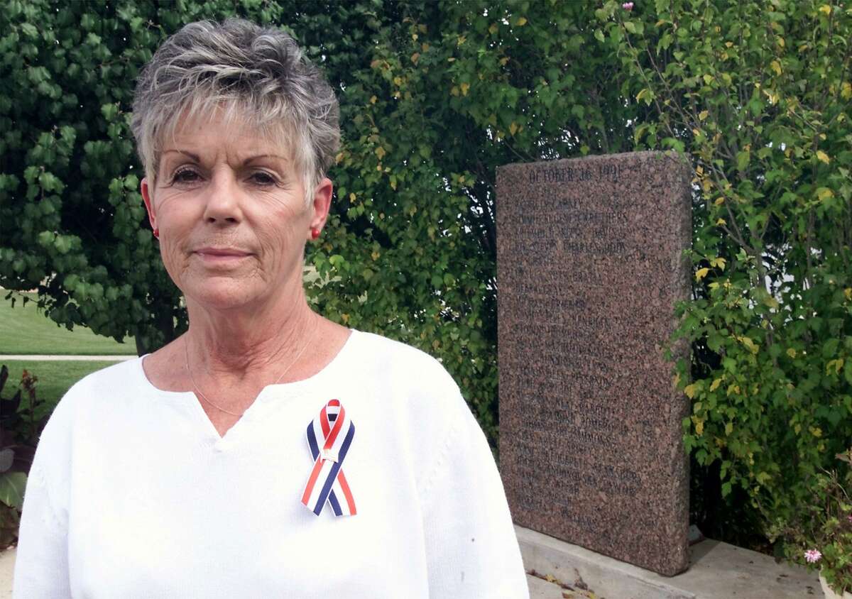 Kelley Fitzwater on Oct. 10, 2011, stands in Killeen near the memorial dedicated to those killed in the Luby’s Cafeteria mass shooting on Oct. 16, 1991. She and her husband survived the shooting.