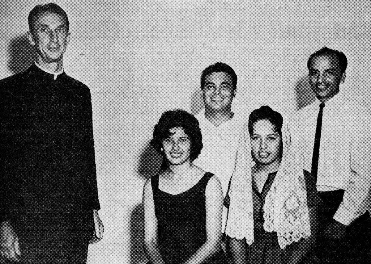 Rev. Joseph Pawlicki, formerly of Manistee, is pictured with four of the five parishioners with whom he served as a papal volunteer in Mexico. The fifth member of his team remained in Mexico to enter a monastery. The first man to the right of Pawlicki is Marcello Tafoya who drove Pawlicki to Manistee for a visit. The photo was published in the News Advocate on Oct. 24, 1962.