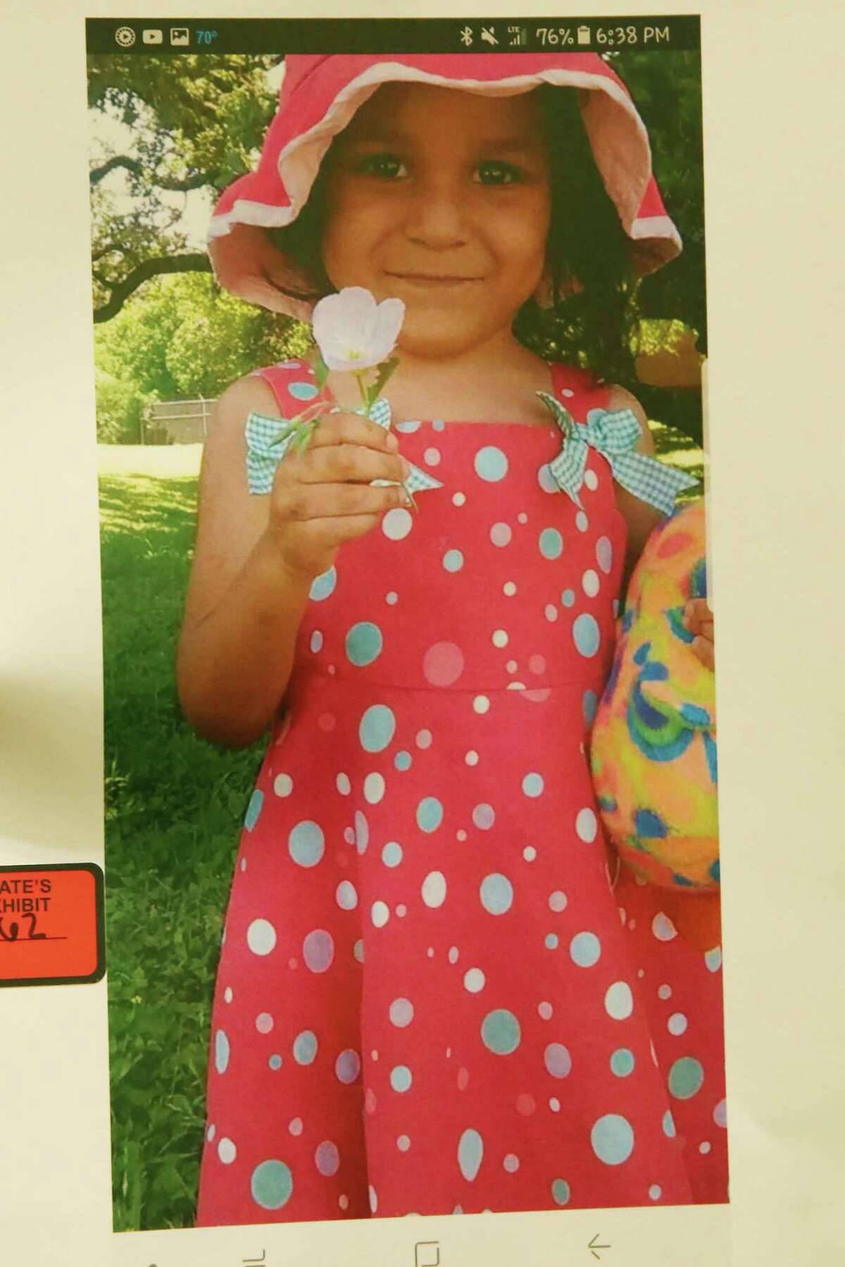 A photo of Olivia Briones is shown during the murder trial of her mother, Jessica Briones, on Friday. The mother is accused of killing Olivia, 4, in 2017.