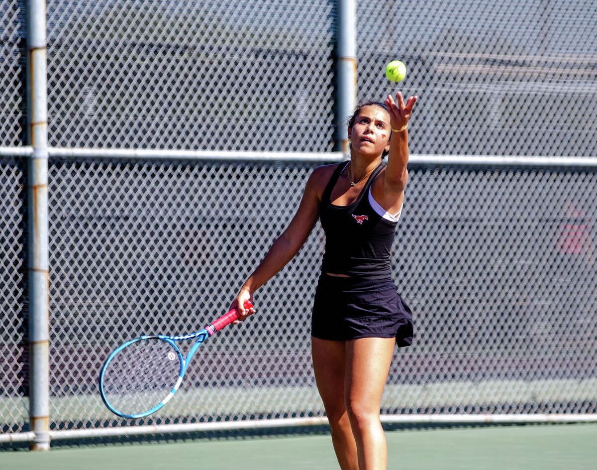 Memorial's Sofia Mazzucato serves the ball during the Region III-6A final against Clements.