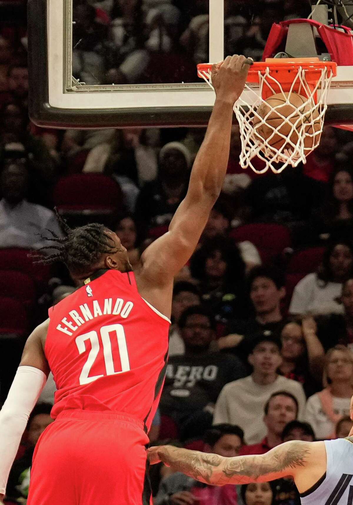 Houston Rockets center Bruno Fernando (20) dunks the ball during the first quarter of a NBA game against the Memphis Grizzlies Friday, Oct. 21, 2022, at Toyota Center in Houston.