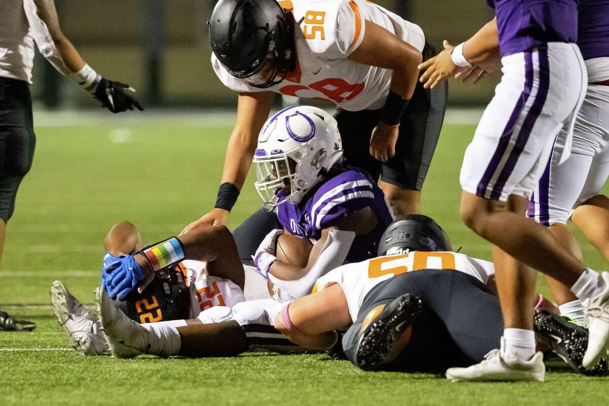 Dayton defensive back Vernon Harrison (20) recovers a fumble by Texas City running back Caleb Bell in a high school football game between Texas City and Dayton Friday, Oct 21, 2022, in Dayton.