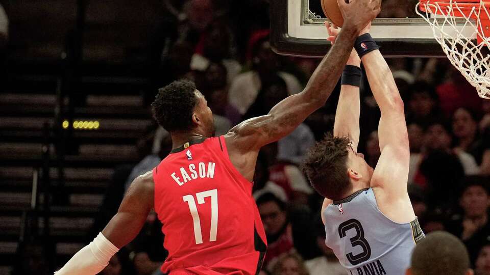 Houston Rockets forward Tari Eason (17) blocks Memphis Grizzlies forward Jake LaRavia (3) during the fourth quarter of a NBA game Friday, Oct. 21, 2022, at Toyota Center in Houston. Houston Rockets lost to Memphis Grizzlies 129-122.