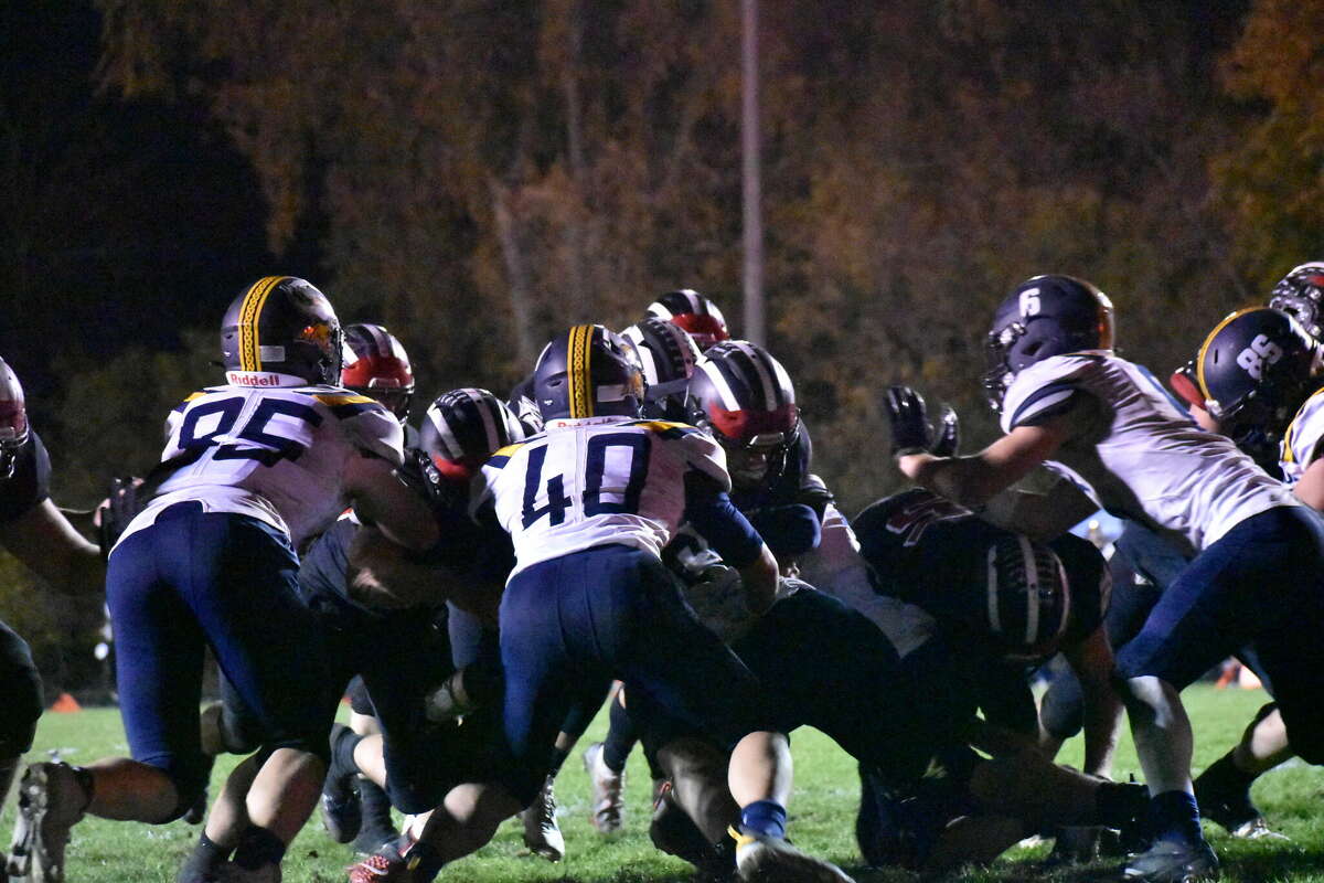 Xavier Allen sneak it in for the game winning touchdown in overtime of Reed City's 16-8 win over Cadillac.