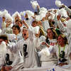Dow High School students and football fans cheer on their football team against their rival, Midland High, on Oct. 21, 2022 at the Midland Community Stadium.