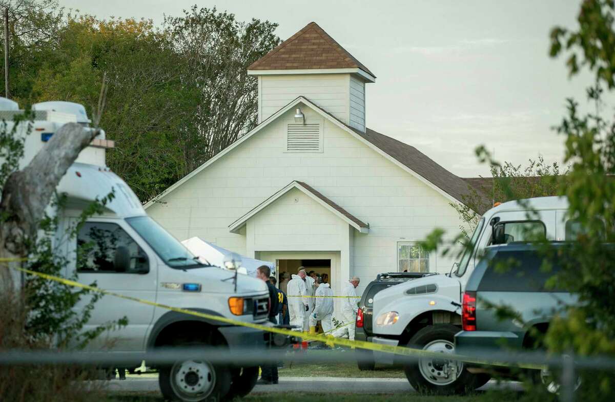 Investigators work at the scene of a mass shooting at the First Baptist Church in Sutherland Springs, Texas on November 5, 2017. (Jay Janner/Austin American-Statesman/TNS)