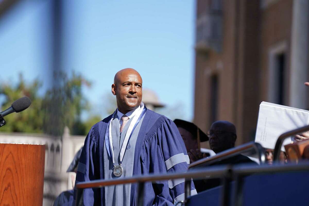 The eighth president of Rice University, Reginald DesRoches, stands on stage after receiving his Rice robe and Presidential Medal at his investiture ceremony on campus on Saturday, October 22, 2022 in Houston, Texas.