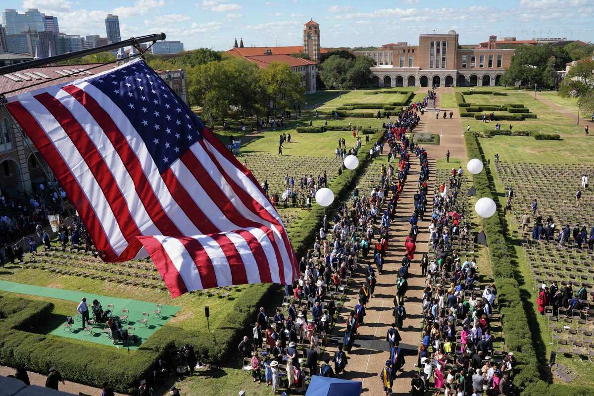 Rice University faculty and students recede from the Academic Quadrangle at the conclusion of the investiture ceremony of the university’s eighth president, Reginald DesRoches, on Saturday, October 22, 2022 in Houston, Texas.