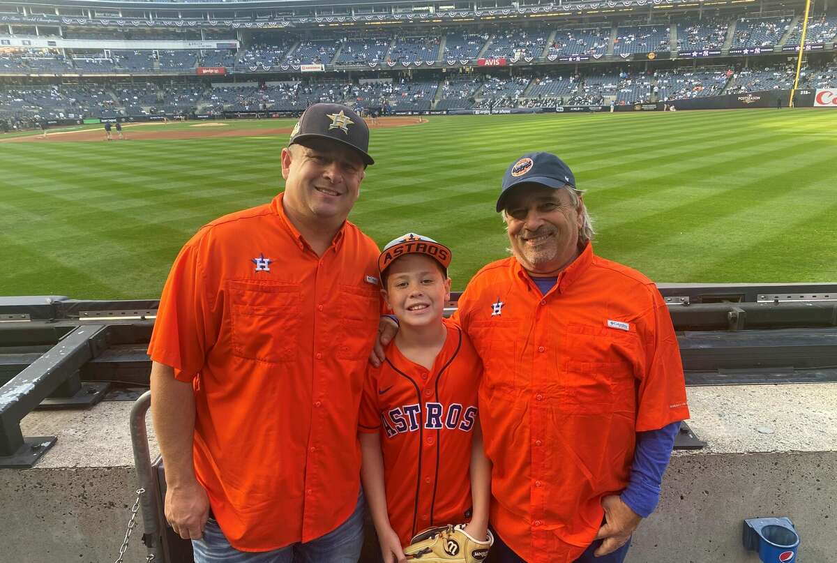 Jeremy Imhoff (left), Jase Imhoff (center) and Gary Imhoff (right) in the right field stands before Game 3 of the Astros-Yankees American League Championship Series on Saturday, Oct. 22, 2022 at Yankee Stadium.