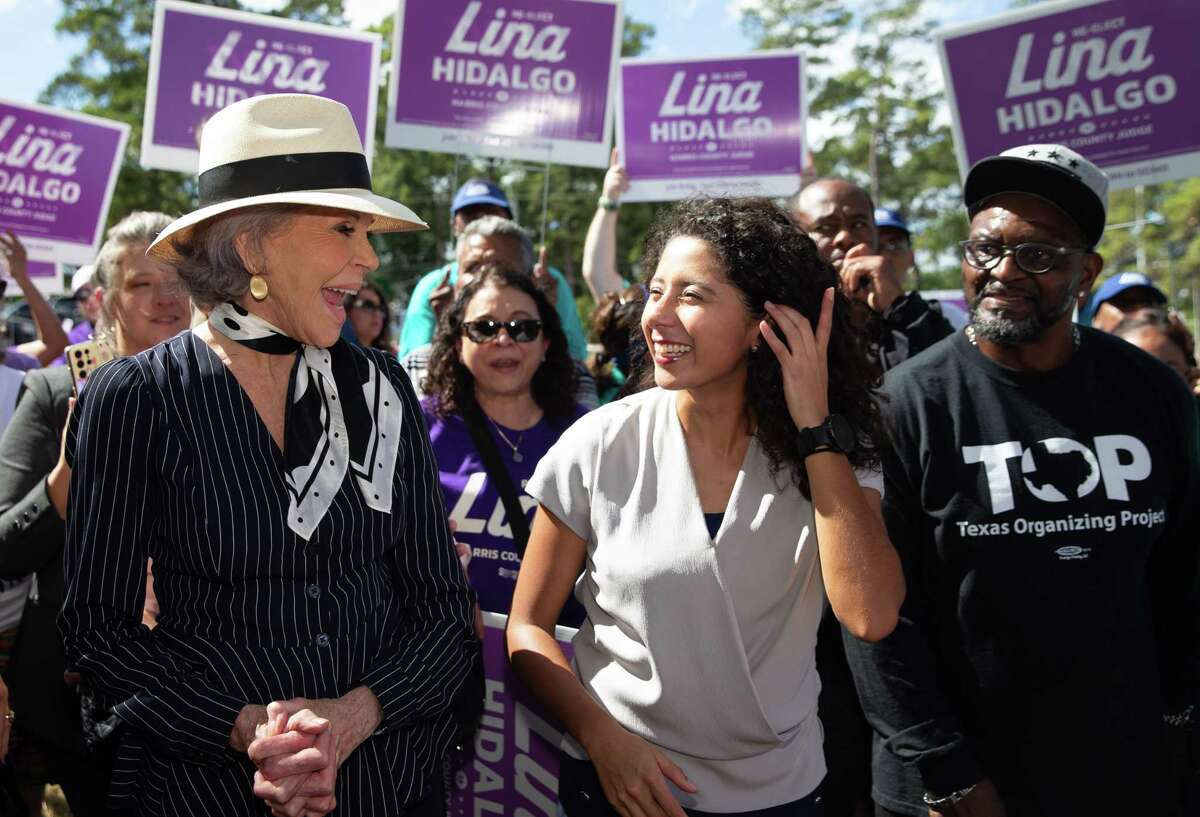 Jane Fonda, Academy Award-winning actress and activist, and Harris County Judge Lina Hidalgo share a smile at the end of a Hidalgo rally Saturday, Oct. 22, 2022, at Mason Park in Houston. It appears to be part of a tour by the Jane Fonda Climate PAC that Fonda launched in March.