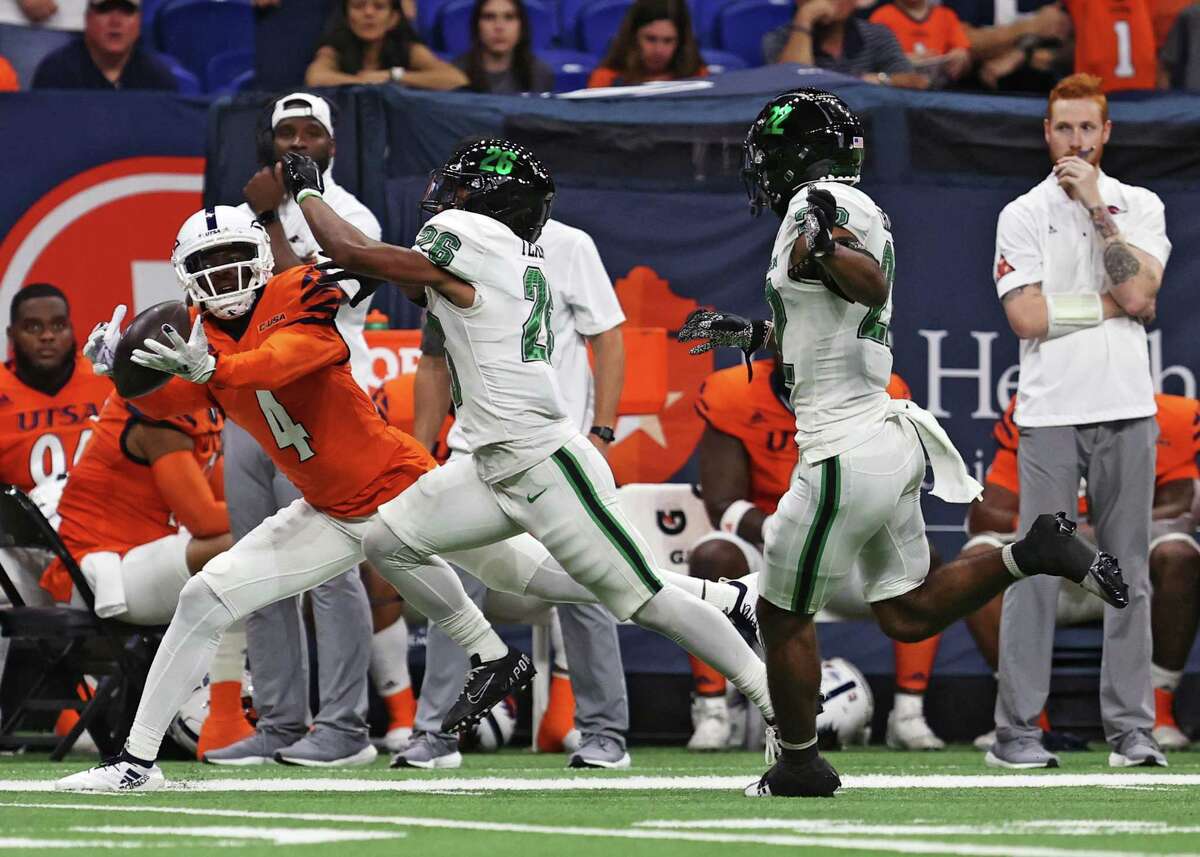 UTSA wide receiver Zakhari Franklin (4) reaches out to catch the ball during the NCAA Conference USA football game against North Texas Saturday, Oct. 22, 2022, at the Alamodome in San Antonio, Texas.