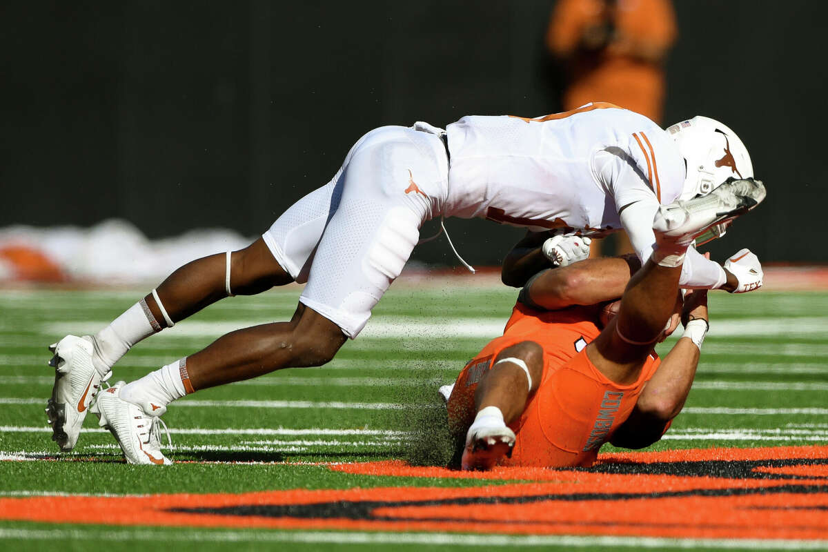 Texas safety Anthony Cook suffered a broken arm in Saturday's loss at Oklahoma State, leaving his status uncertain for when the Longhorns return from their open date.
