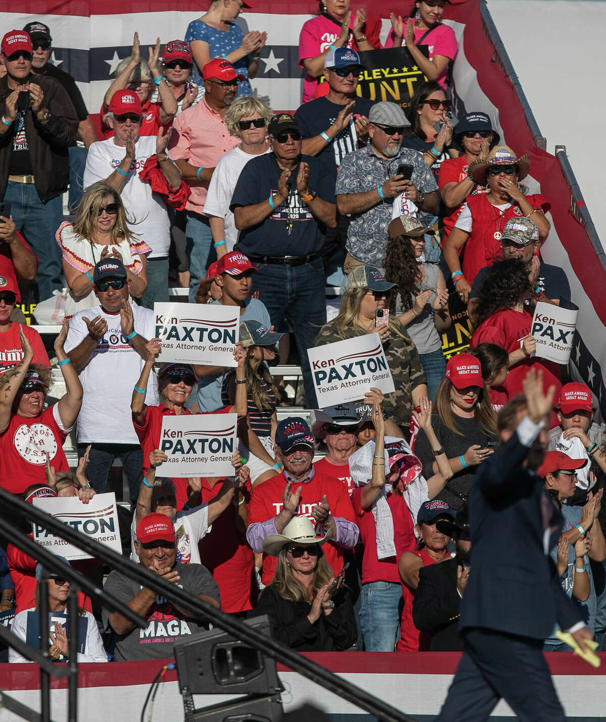 Supporters of Texas Attorney General Ken Paxton cheer arsenic  helium  leaves the signifier    during President Donald Trump's Save America rally held astatine  the Richard M. Borchard Regional Fairgrounds successful  Robstown, TX, connected  Oct. 22, 2022.