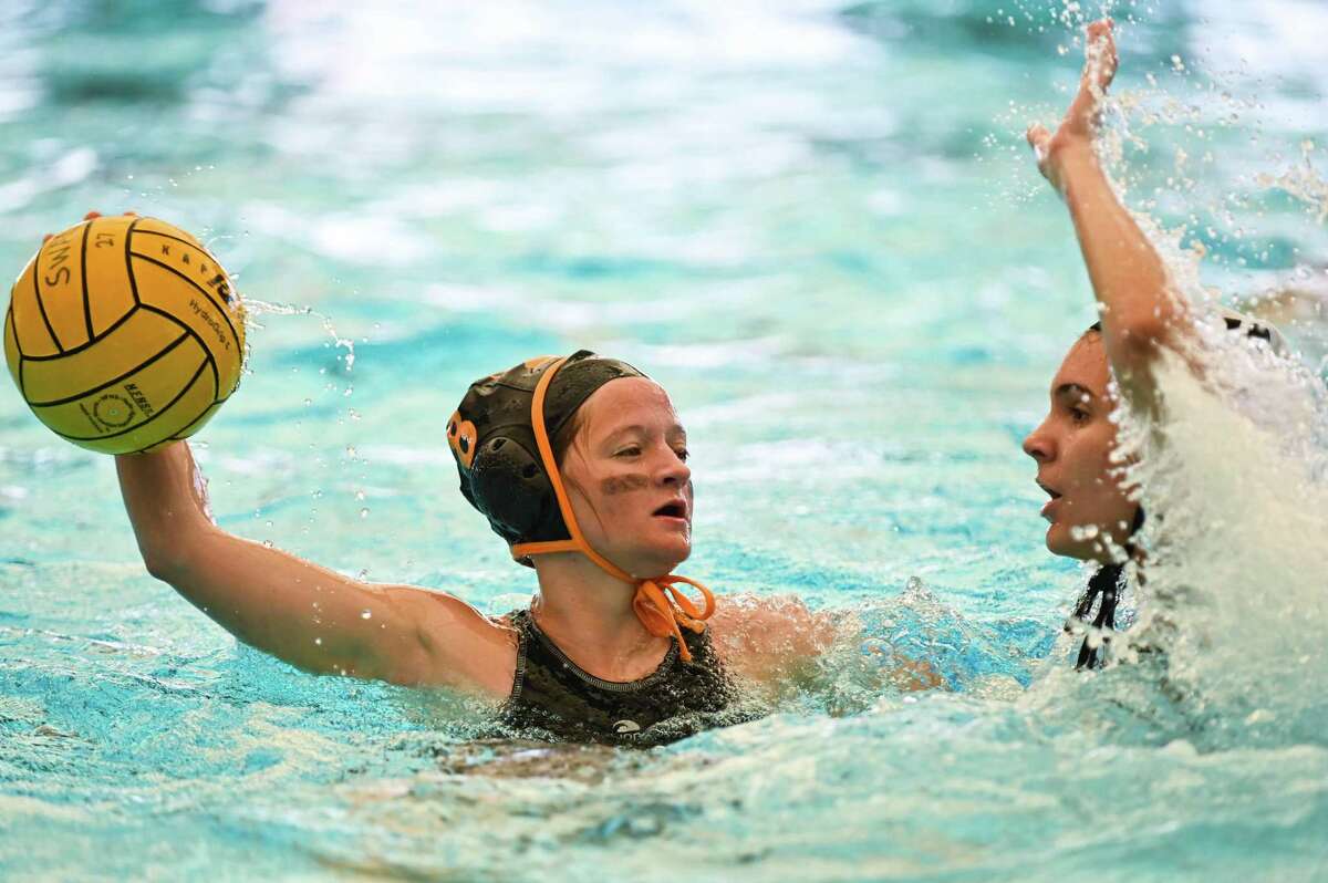 Scott Slay helps Champion’s water polo team find a direction