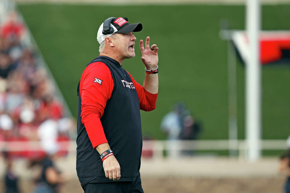 Texas Tech coach Joey McGuire yells out to his players during the second half of a college football game against West Virginia, Saturday, Oct. 22, 2022, in Lubbock. (AP Photo/Brad Tollefson)