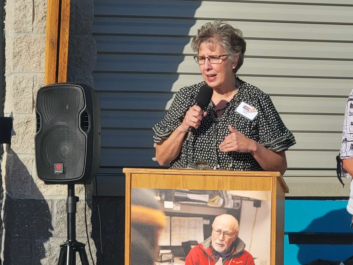 Gerri VanAntwerp, executive director for Benzie Area Christian Neighbors, thanks the members of the community who helped make the organization's new building a reality during an open house for the new facility on Oct. 22.