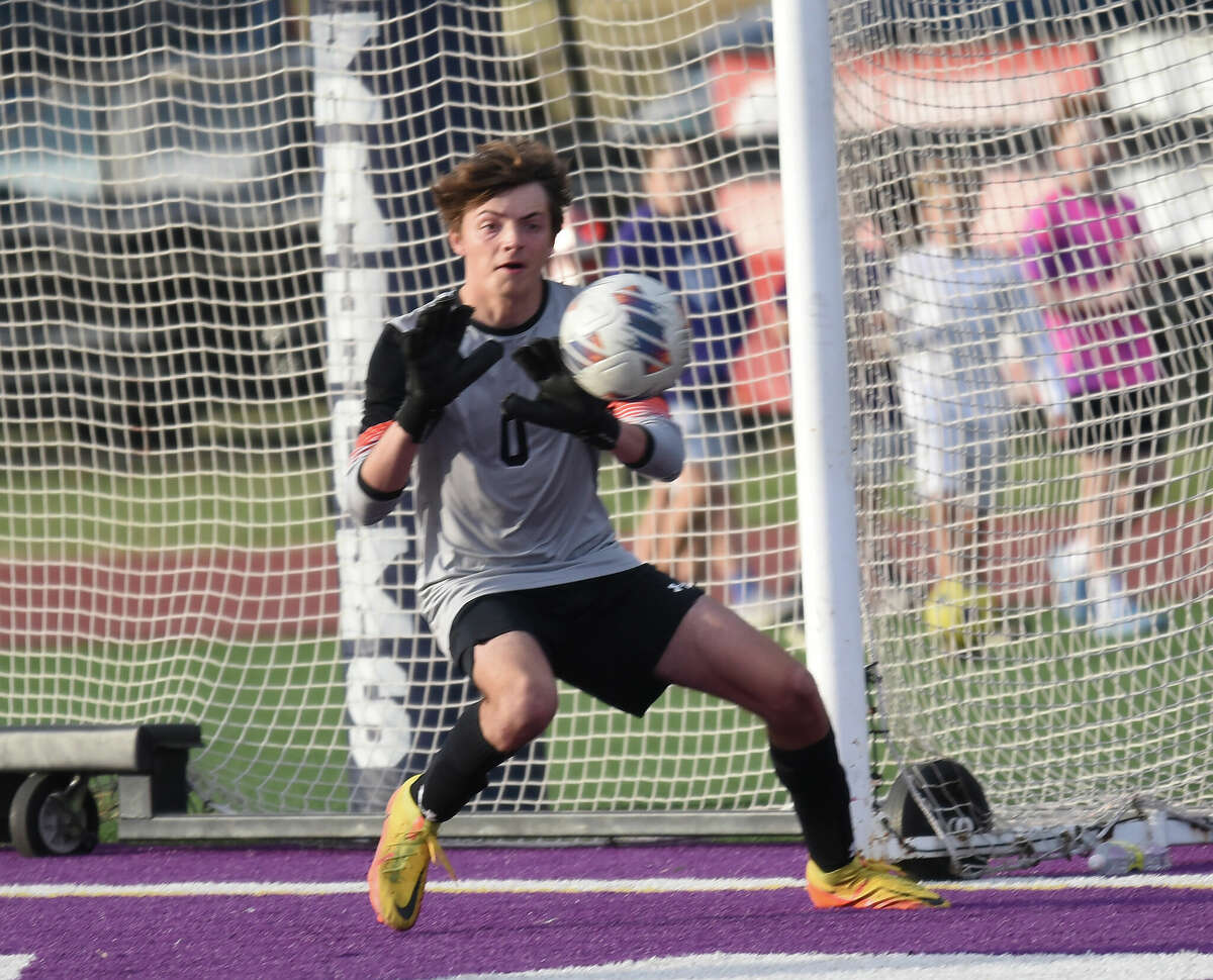 Edwardsville's Zach Chitwood makes a save against Collinsville on Saturday in the Class 3A Collinsville Regional championship game in Collinsville.