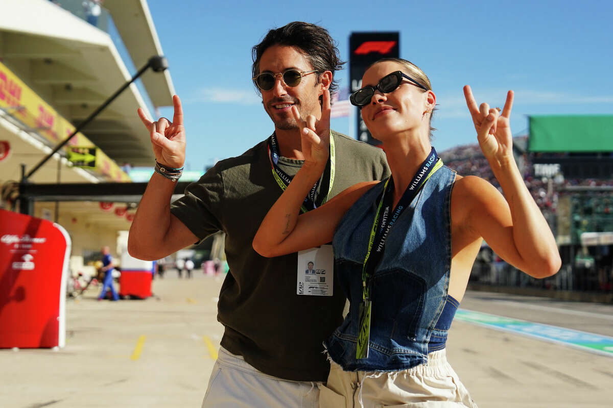 AUSTIN, TEXAS – OCTOBER 22: Andrew Joblon and Claire Holt visit Williams Racing during the Formula 1 United States Grand Prix at Circuit of the Americas on October 22, 2022 in Austin, Texas.  (Photo by Alex Bierens de Haan/Getty Images for Williams Racing)