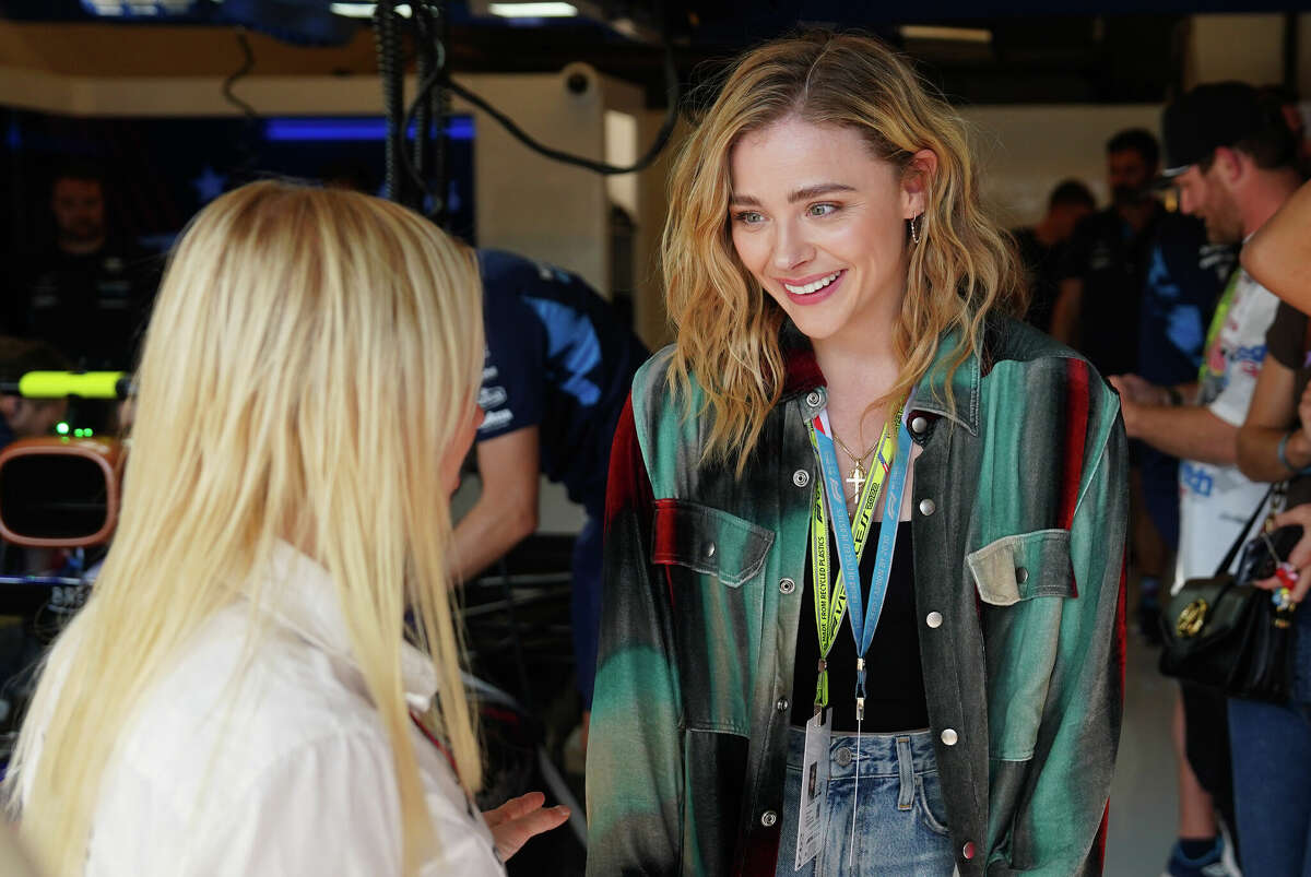 AUSTIN, TEXAS - OCTOBER 22: Chloe Grace Moretz visits Williams Racing during the Formula One United States Grand Prix at Circuit of the Americas on October 22, 2022 in Austin, Texas.  (Photo by Alex Bierens de Haan/Getty Images for Williams Racing)