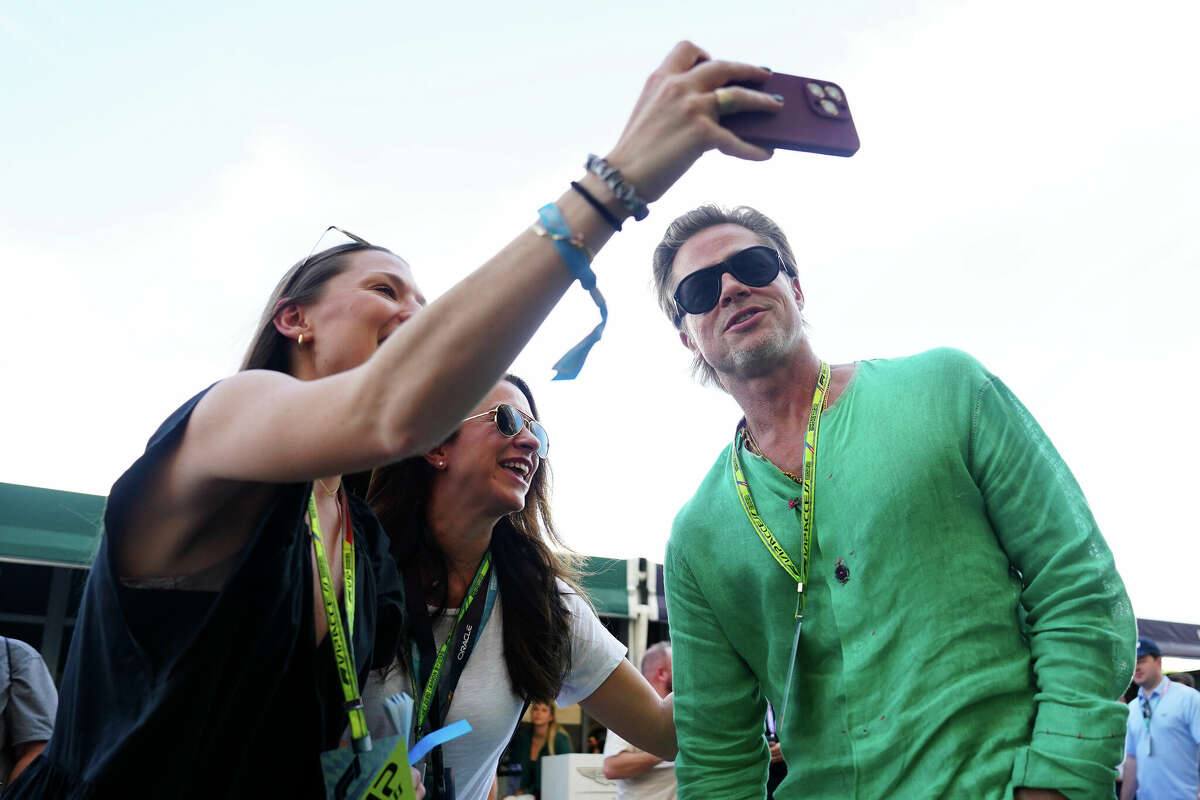 AUSTIN, TEXAS - OCTOBER 22: Brad Pitt visits the paddock during the Formula 1 United States Grand Prix at Circuit of the Americas on October 22, 2022 in Austin, Texas.  (Photo by Alex Bierens de Haan/Getty Images for Williams Racing)