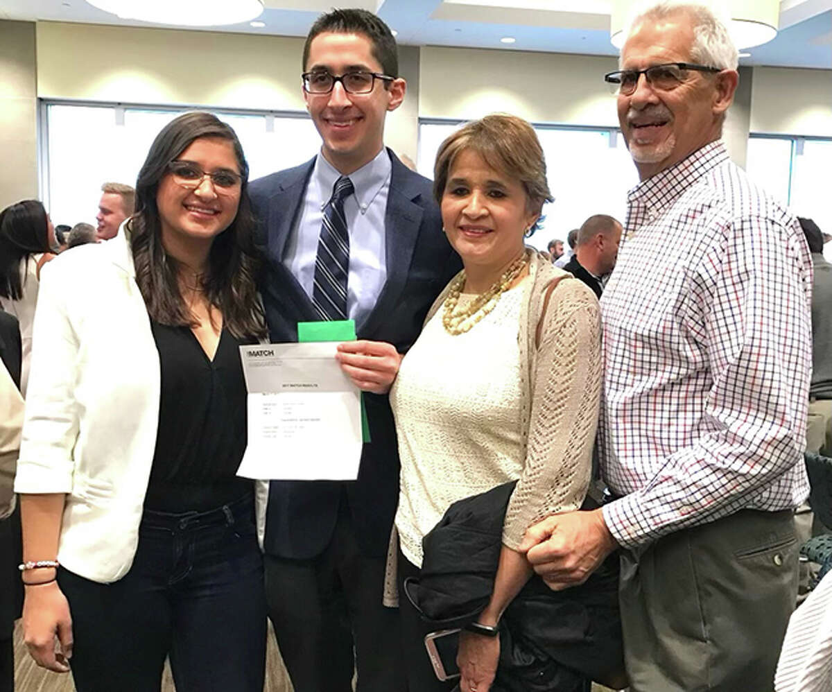 Metro-East Lutheran graduate Bob Schnietz, second from left, with his family during residency match day at Southern Illinois University School of Medicine.