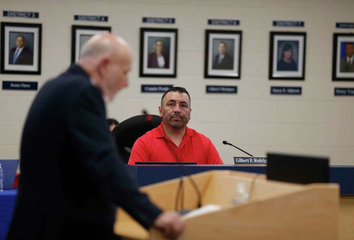 Board member Gilbert F. Rodriquez listen to a presentation on July 26, days before he was forced off the board by a resignation letter from February that he never retracted or acted on.