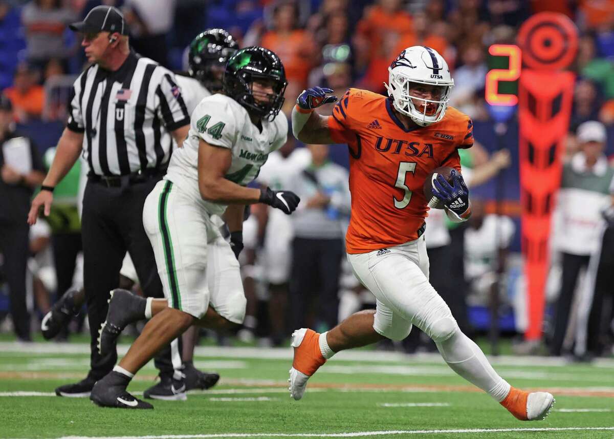 UTSA running back Brenden Brady (5) runs with the ball during the NCAA Conference USA football game against North Texas Saturday, Oct. 22, 2022, at the Alamodome in San Antonio, Texas.