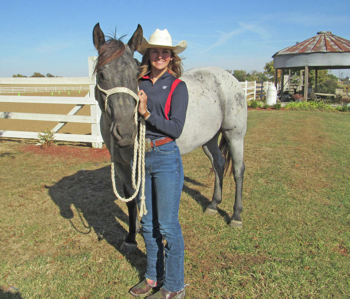 Grace Heepke with her horse, Goose. Heepke, a junior at Edwardsville High School, recently did a weeklong horseback ride with veteran Matt Perella, who is raising awareness and funds to benefit U.S. veterans.