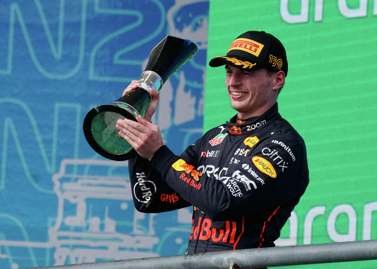 Max Verstappen hoists the trophy after winning the Formula 1 United States Grand Prix Sunday at the Circuit of the America's in Austin.