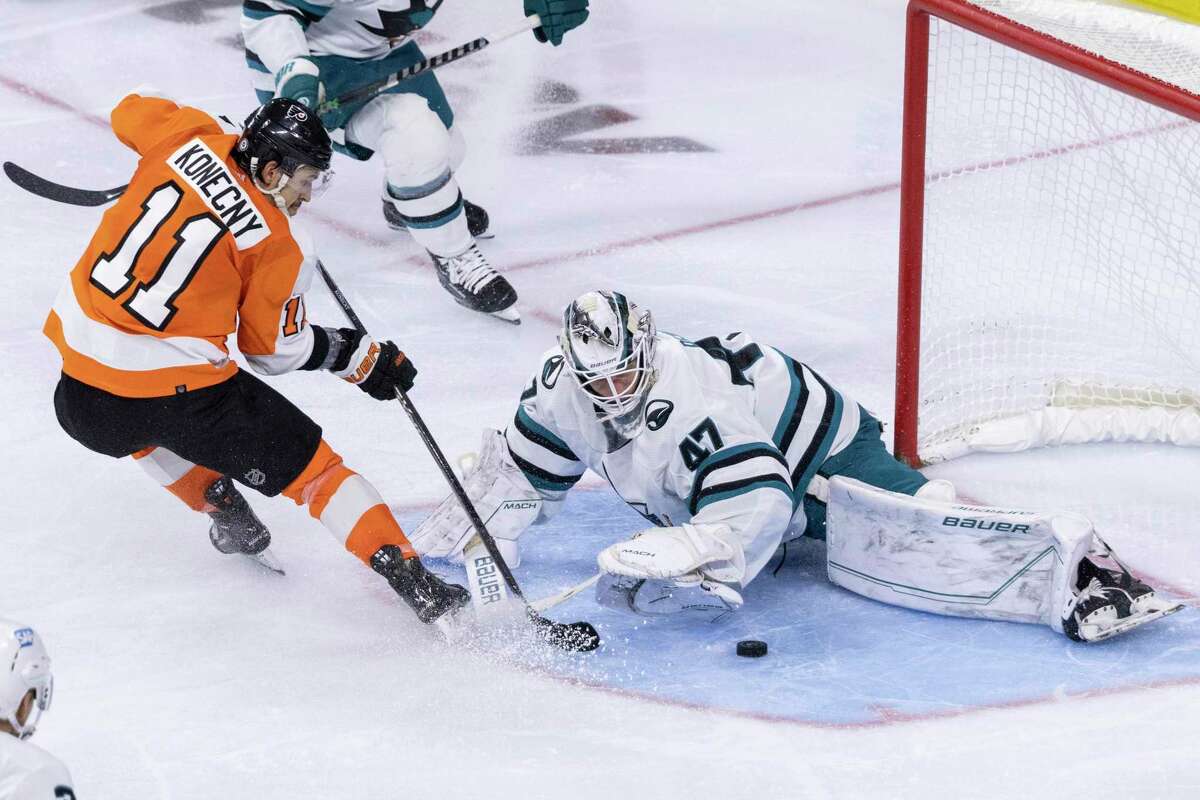 Sharks goaltender James Reimer blocks a shot from Flyers right wing Travis Konecny during the second period of San Jose’s shutout victory.