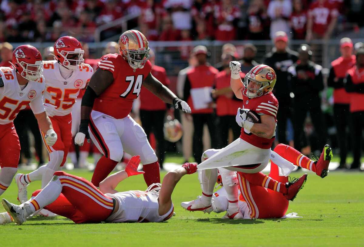 San Francisco 49ers running back Christian McCaffrey (23) runs the ball in  the first quarter an NFL football game against the Kansas City Chiefs,  Sunday, Oct. 23, 2022 in Santa Clara, Calif. (