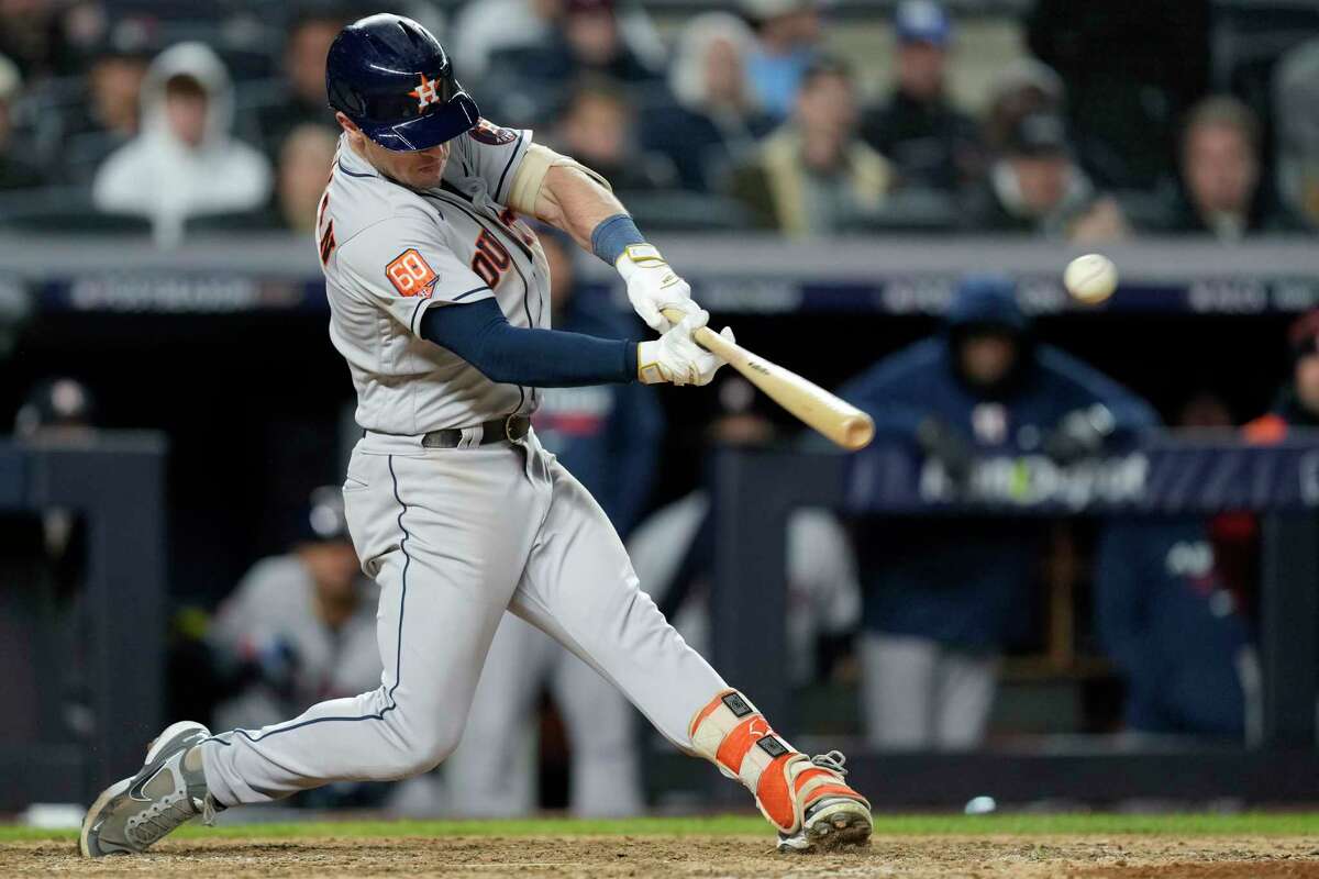 Houston Astros Alex Bregman (2) hits an RBI single to take a 6-5 lead in the seventh inning of Game 4 during the American League Championship Series at Yankee Stadium on Sunday, Oct. 23, 2022, in New York.