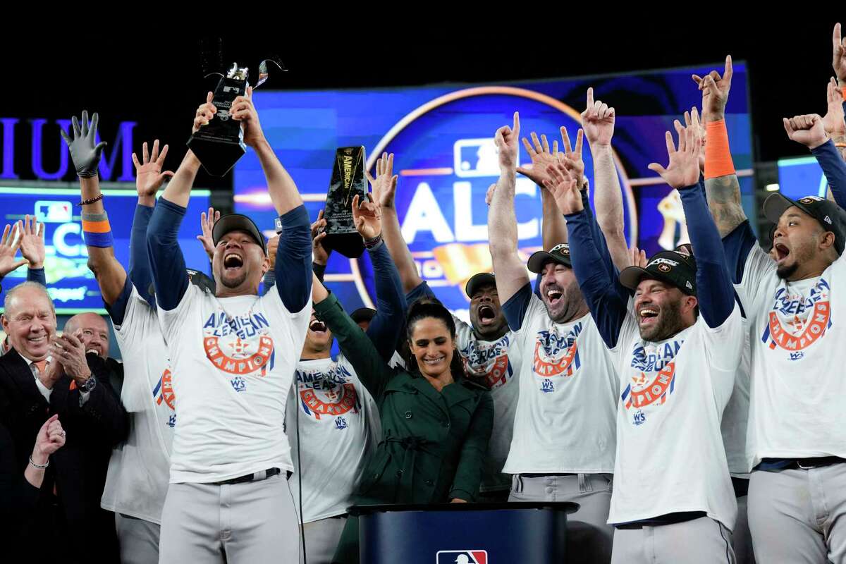 The Houston Astros celebrate after winning the American League pennant following a sweep of the New York Yankees at Yankee Stadium on Sunday, Oct. 23, 2022, in New York.