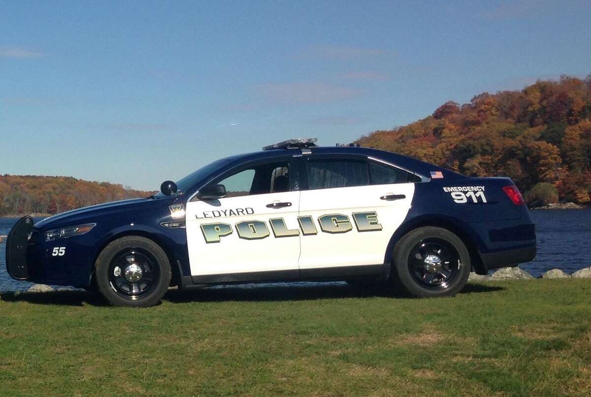 A Ledyard Police Department vehicle is shown in this file photo. Police on Saturday used a K-9 unit to track down a man who punched a minor outside a store before stealing their wallet and cellphone, officials said.